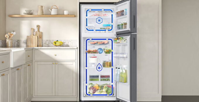 The Samsung 396L Refrigerator with Twin Cooling Technology combines style, performance, and advanced features to enhance your kitchen. With Twin Cooling Plus™ technology, it maintains separate cooling systems for the fridge and freezer, ensuring optimal freshness without odor mixing. The 5-in-1 Convertible feature offers flexible storage, allowing you to switch between five modes to suit your needs. It’s energy-efficient with AI Energy Mode, saving up to 10% on energy bills, and can be controlled remotely via the SmartThings app. Its sleek design features recessed handles and a premium Real Stainless finish, while additional features like Power Cool, Power Freeze, and SmartThings lighting enhance convenience. Ideal for modern homes, it’s equipped with a digital inverter compressor, offering reliable, long-lasting performance with a 20-year warranty. Samsung Refrigerator Price in Nepal [Updated 2025]